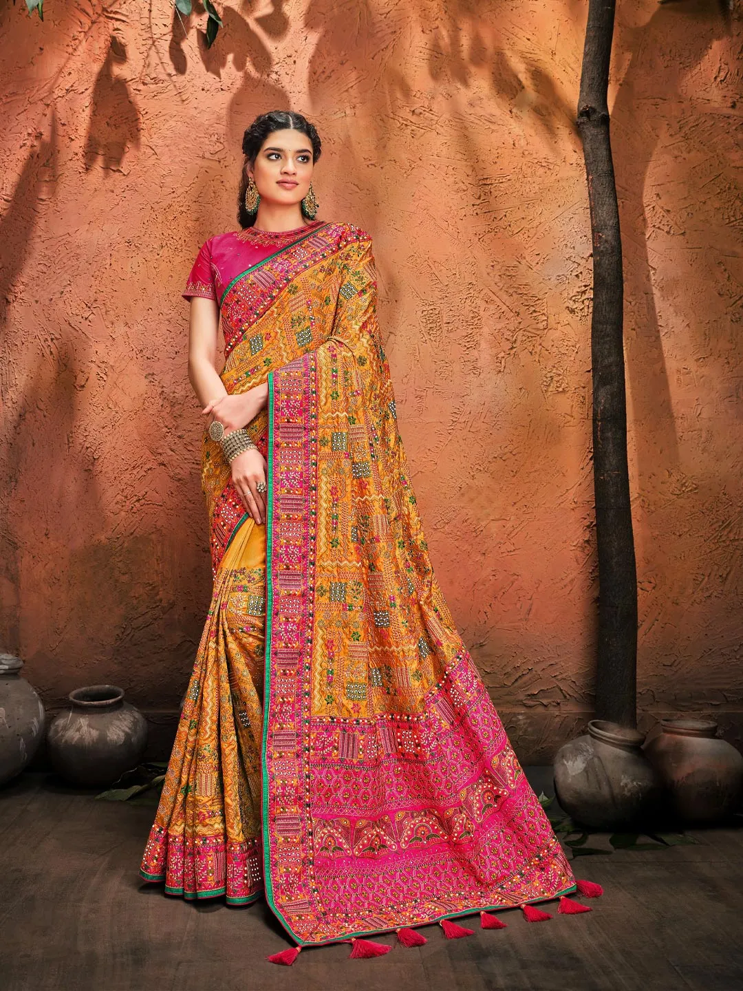 Exquisite Yellow & Pink Kutchi Work All Over Saree